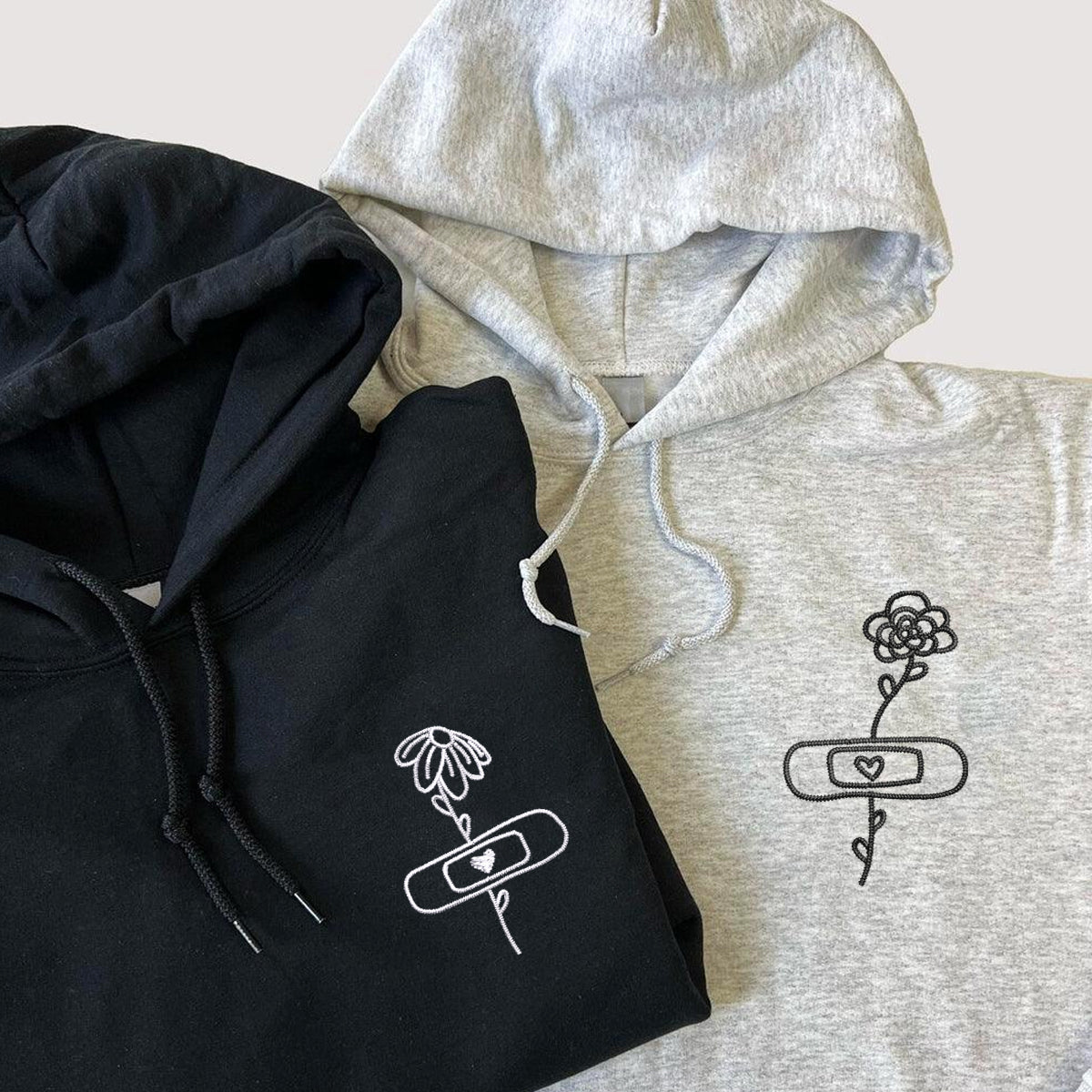 Flower with Bandaid Matching Hoodies for Couples - Custom Embroidered Sweatshirts